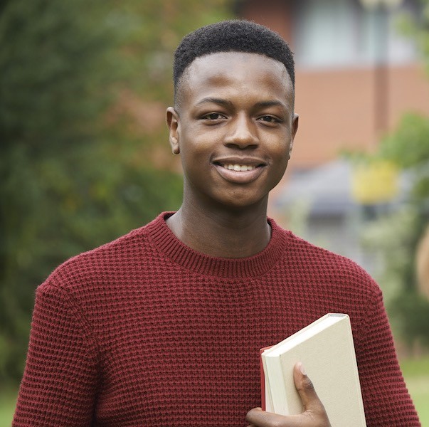 Portrait Of Student Group Outside College Building